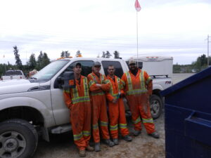 Belterra Workers Four workers close to a truck