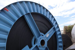 Yokohama conveyor belt roll in a blue reel