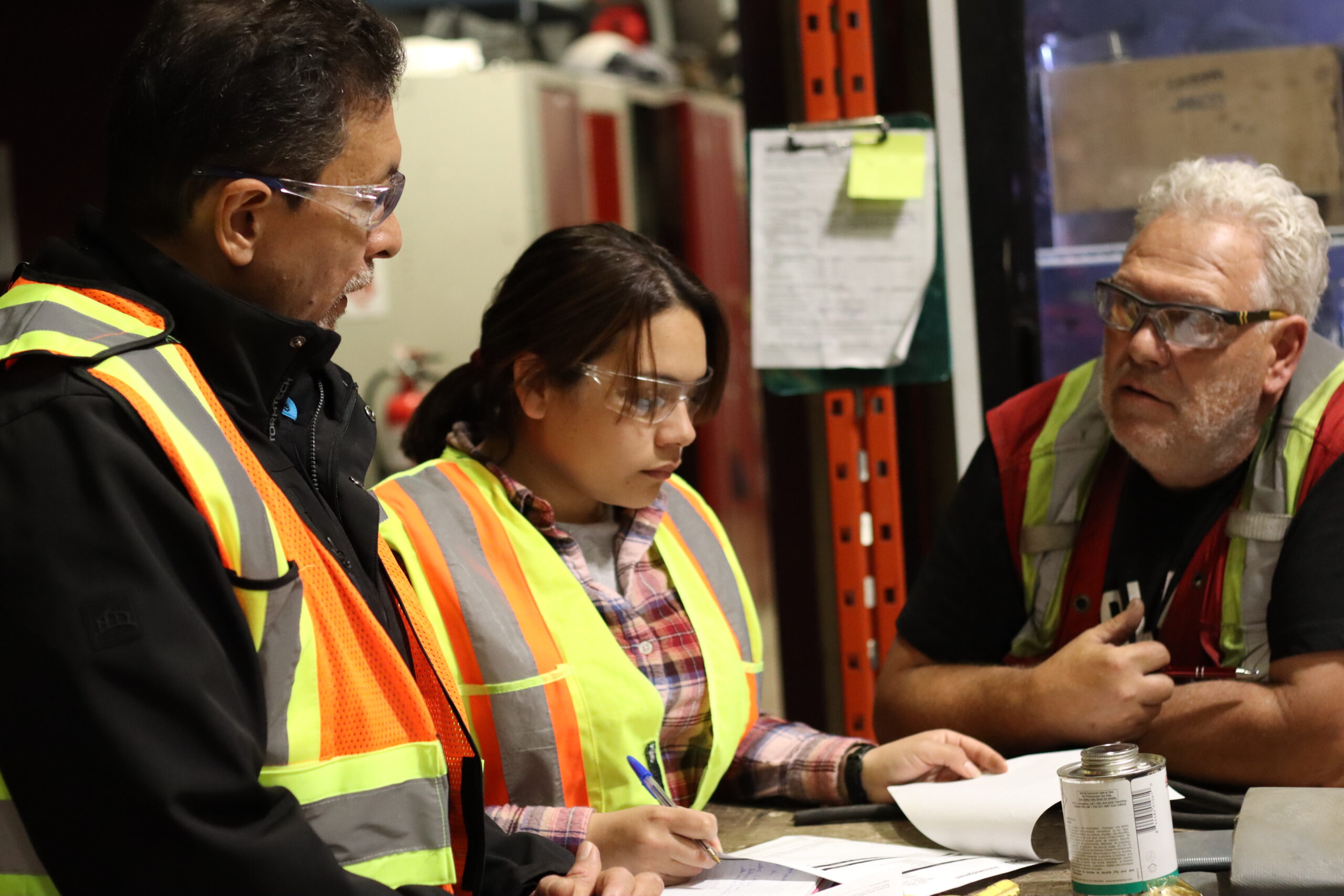 Workers service a transfer point